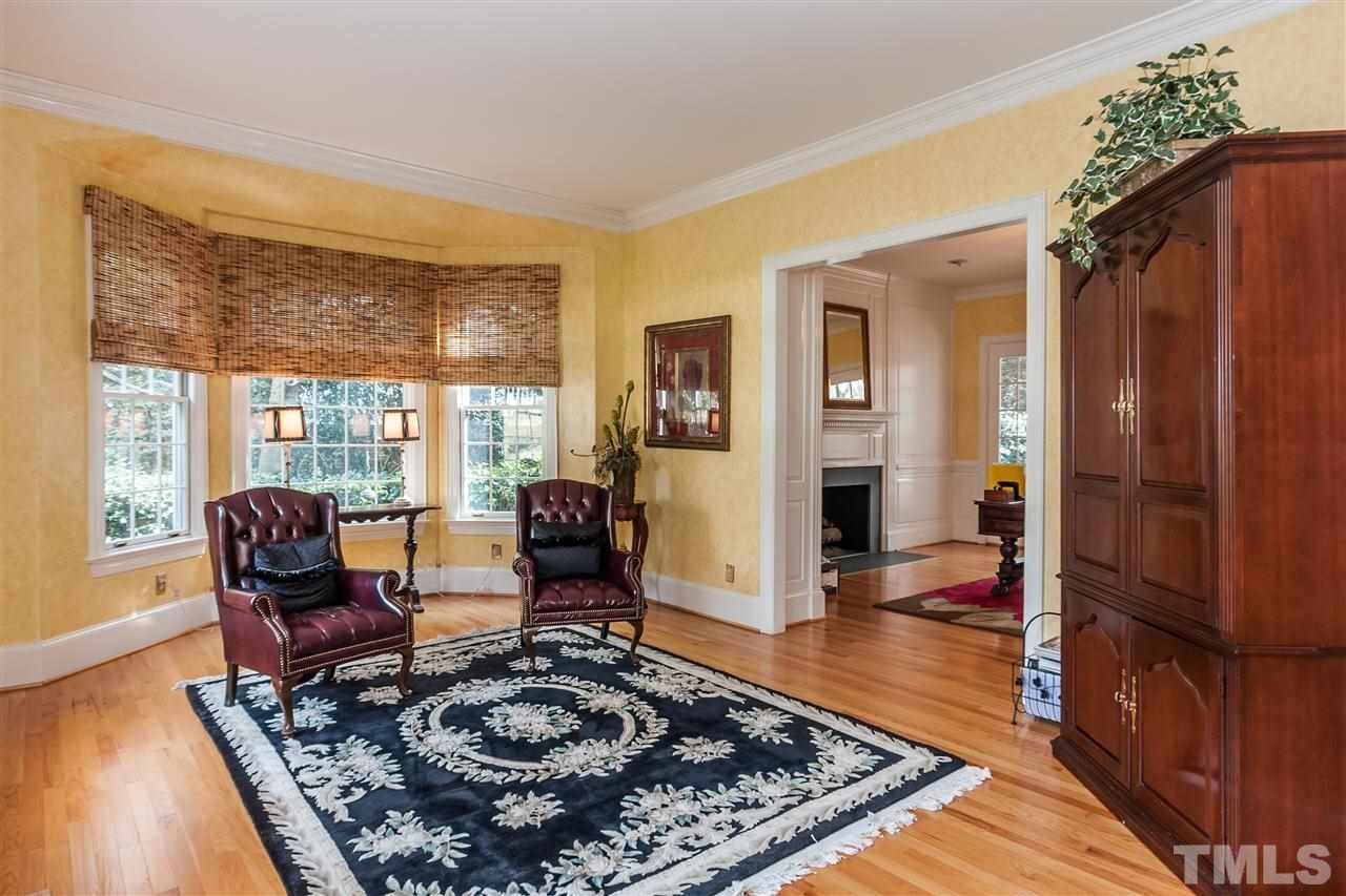 405 Lake Boone Trail Raleigh, NC 27608 - Photo 5 of 24 a living room with furniture rug and wooden floor