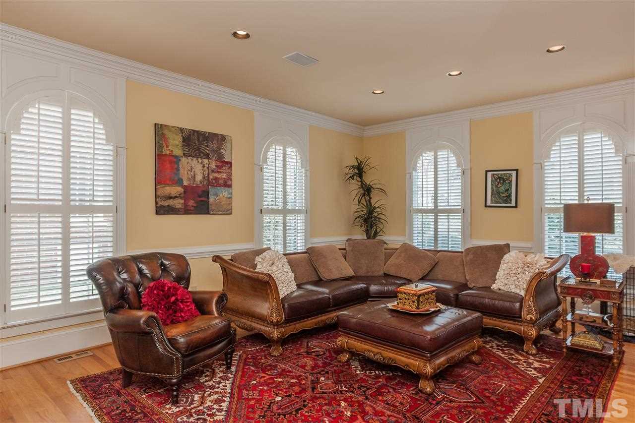 405 Lake Boone Trail Raleigh, NC 27608 - Photo 7 of 24 a living room with furniture and a large window