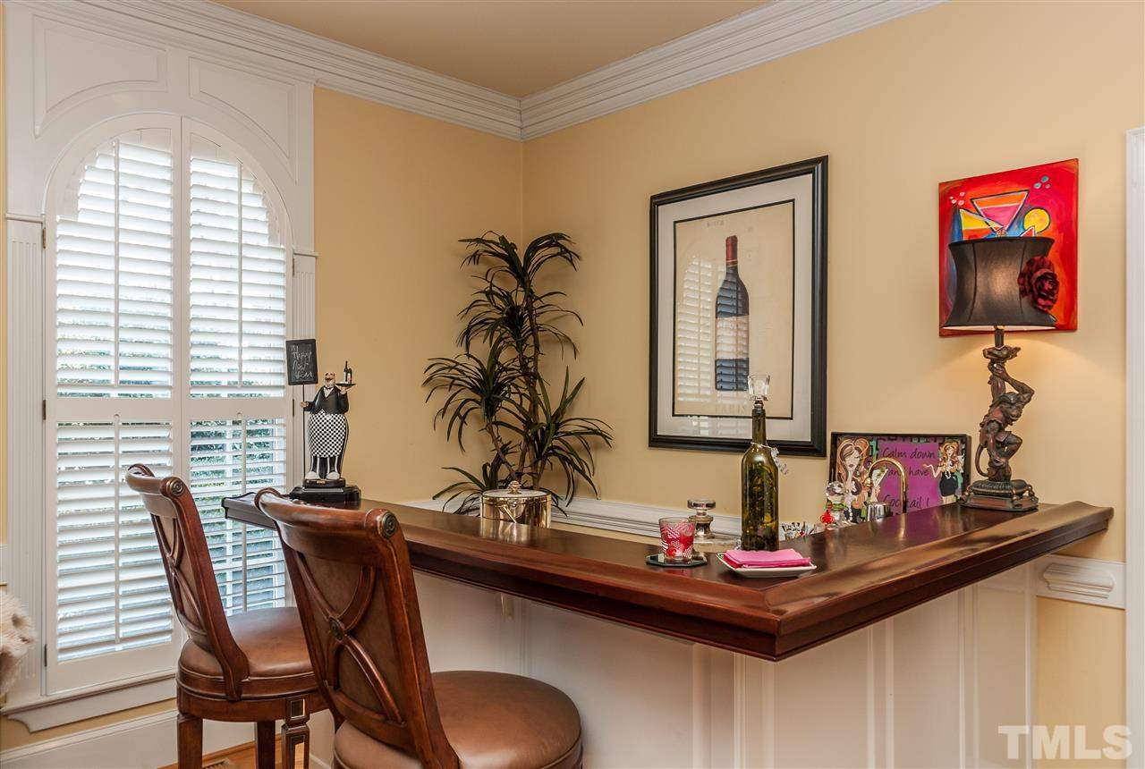 405 Lake Boone Trail Raleigh, NC 27608 - Photo 9 of 24 a view of a dining room with furniture and window