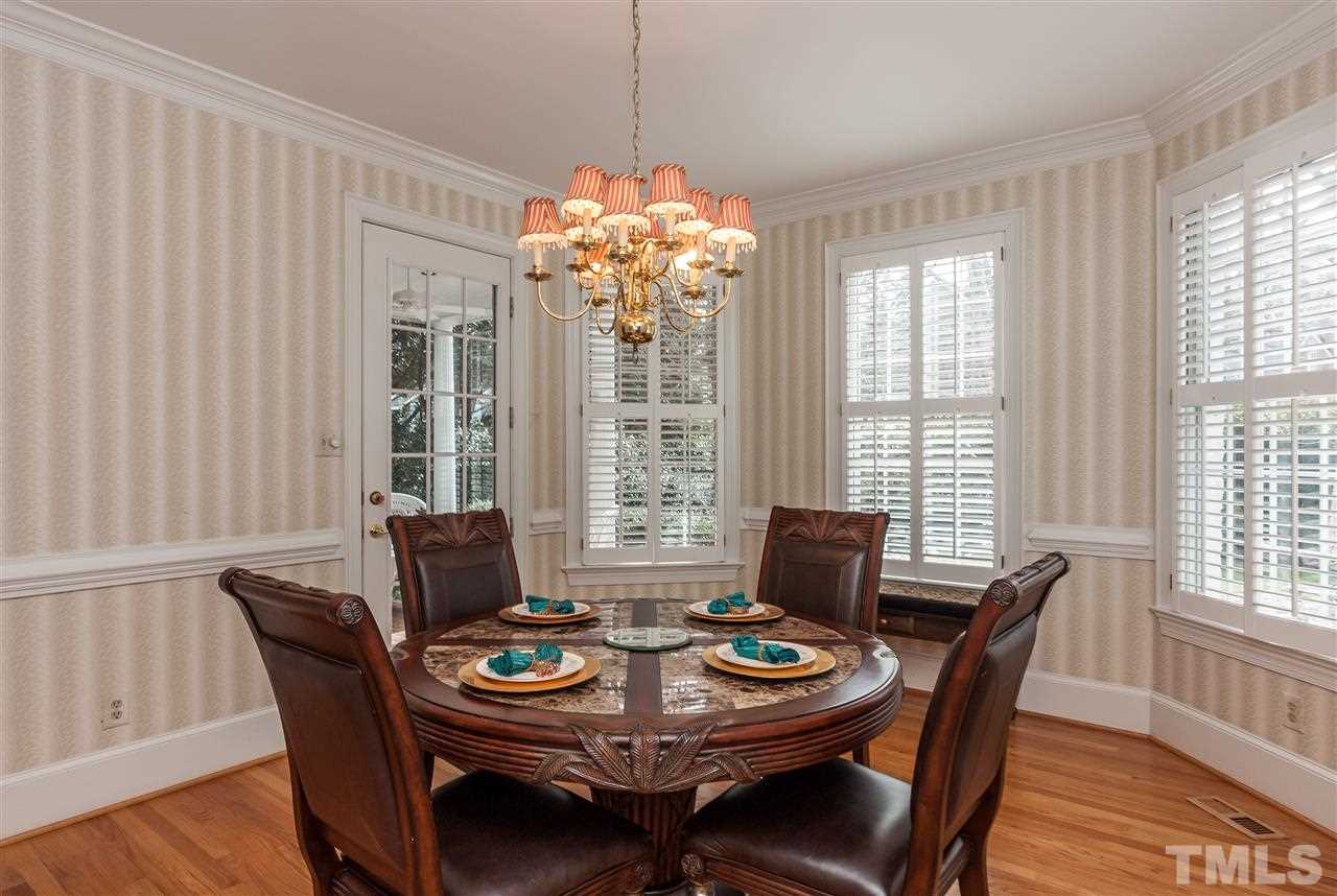 405 Lake Boone Trail Raleigh, NC 27608 - Photo 10 of 24 a view of a dining room with furniture window and outside view