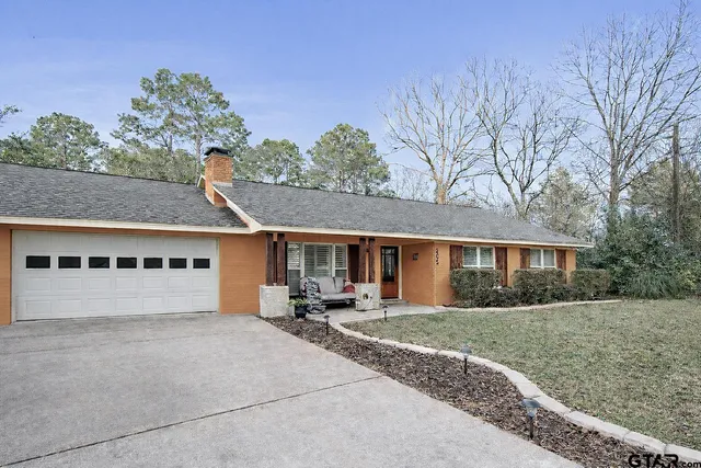 front view of house with a yard