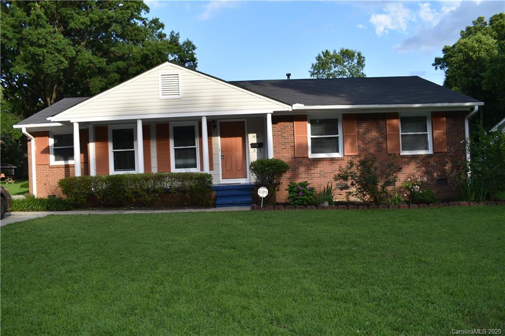 3816 Farmview Road Charlotte, NC 28205 - Photo 10 of 11 a front view of a house with garden