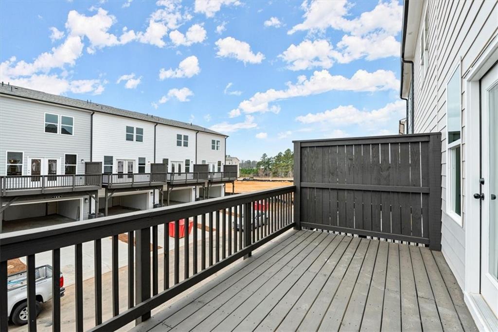741 Payton Lane Acworth, GA 30102 - Photo 20 of 36 a view of a balcony with wooden floor