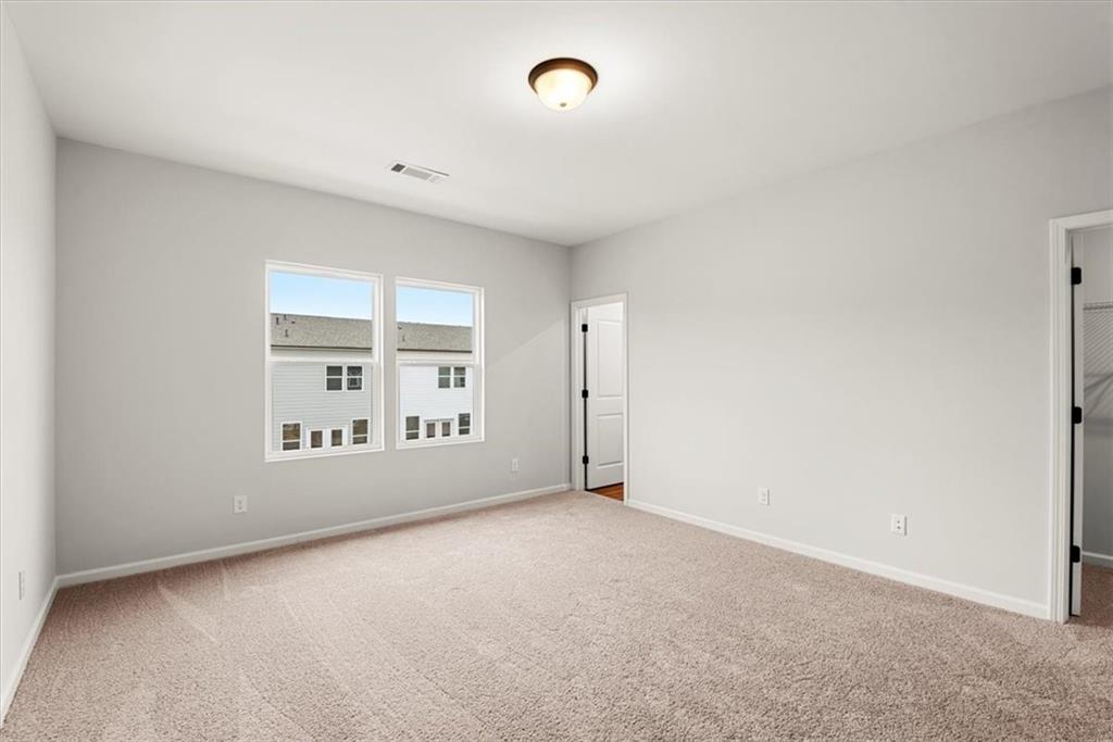 741 Payton Lane Acworth, GA 30102 - Photo 25 of 36 a view of an empty room with a window