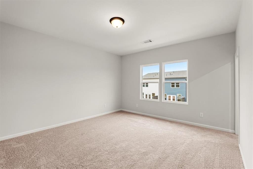 741 Payton Lane Acworth, GA 30102 - Photo 26 of 36 an empty room with windows