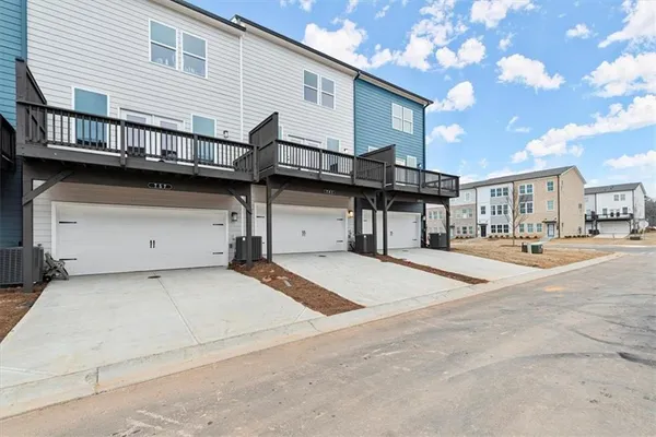 a view of a house with a garage
