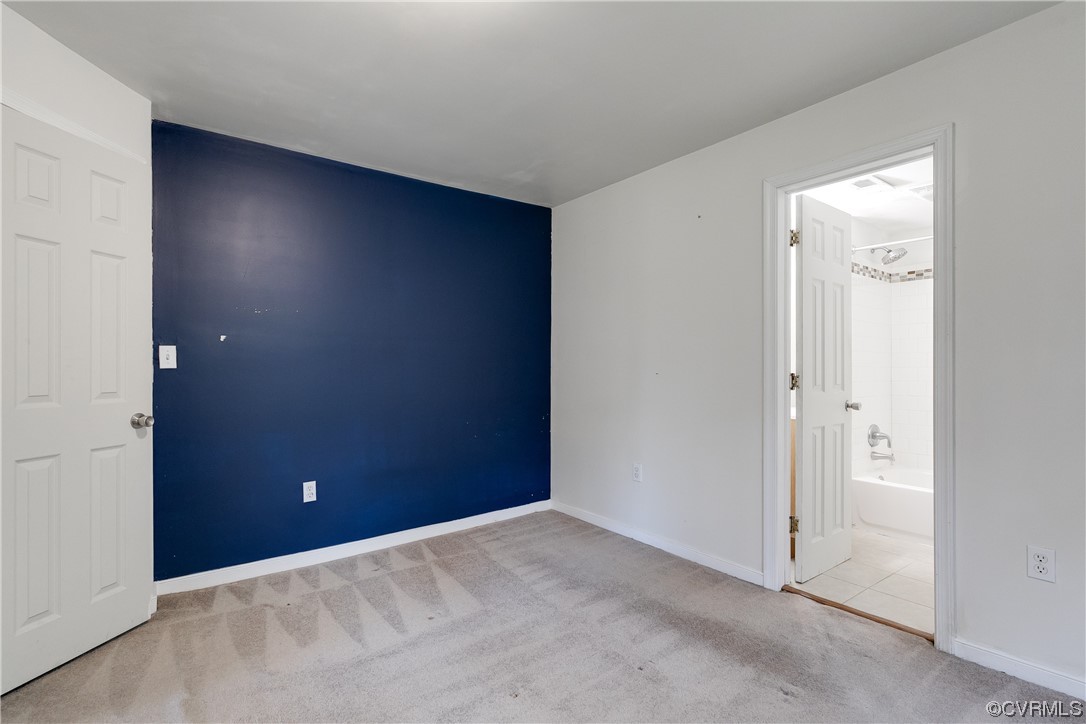 4144 Broad St Road Gum Spring, VA 23065 - Photo 11 of 34 an empty room with closet and a bathroom