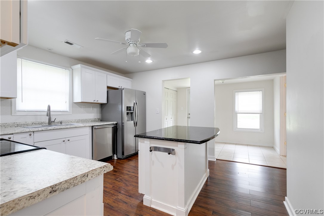 4144 Broad St Road Gum Spring, VA 23065 - Photo 15 of 34 a kitchen with a sink stove and refrigerator