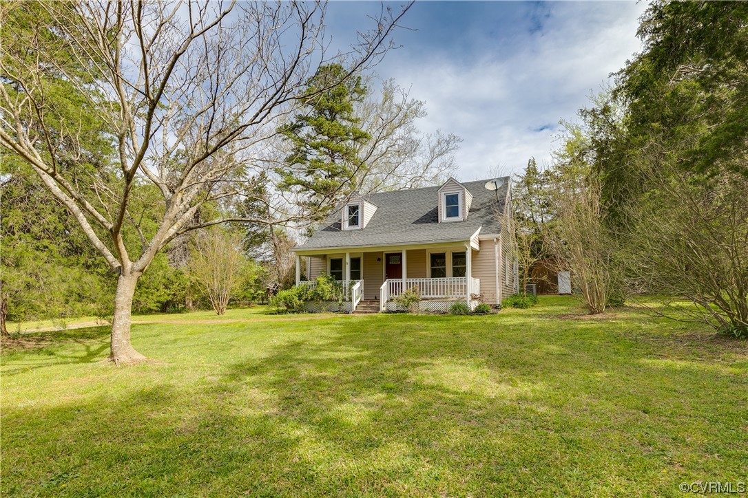 4144 Broad St Road Gum Spring, VA 23065 - Photo 2 of 34 a front view of a house with a yard