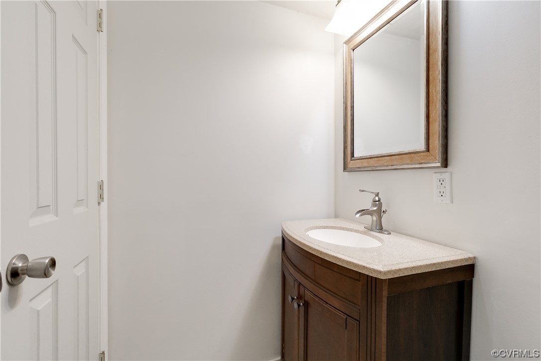 4144 Broad St Road Gum Spring, VA 23065 - Photo 21 of 34 a bathroom with a sink and a mirror