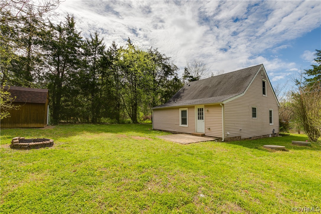 4144 Broad St Road Gum Spring, VA 23065 - Photo 28 of 34 a view of a house with a yard