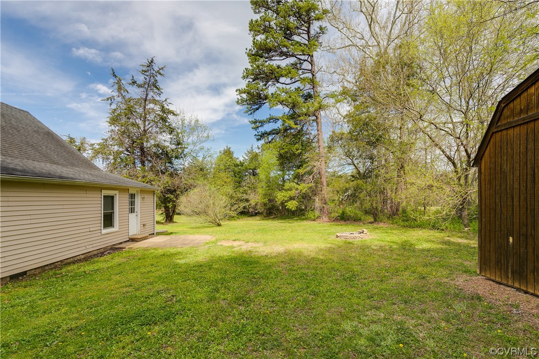4144 Broad St Road Gum Spring, VA 23065 - Photo 30 of 34 a view of a yard with a house