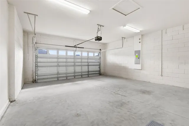 an aerial view of a city with lake view