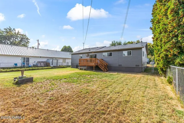 a house view with a garden space