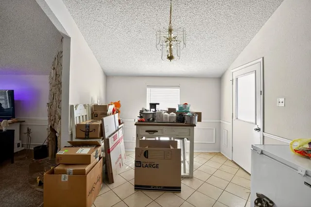 a kitchen with a sink stove and refrigerator
