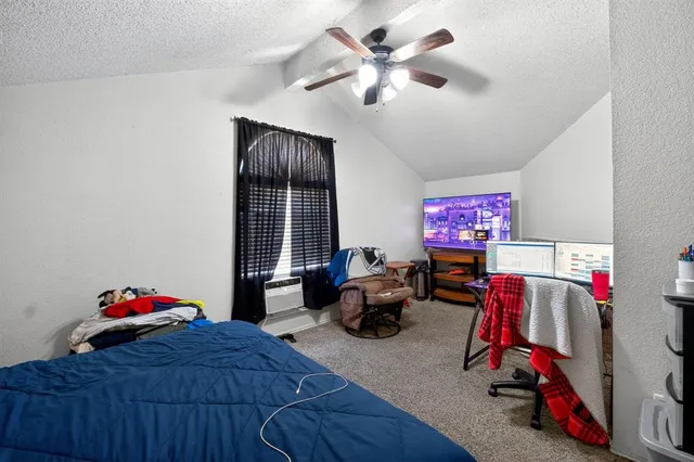 a room with toys and a wooden floor