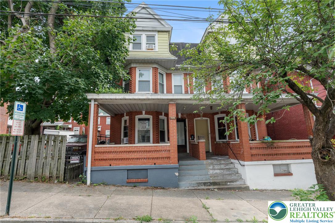 728 East 6th Street, Unit 1 Bethlehem, PA 18015 - Photo 1 of 15 a front view of a house with a tree