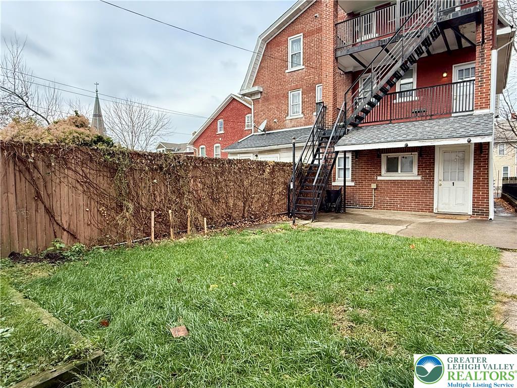 728 East 6th Street, Unit 1 Bethlehem, PA 18015 - Photo 12 of 15 a front view of a house with a yard
