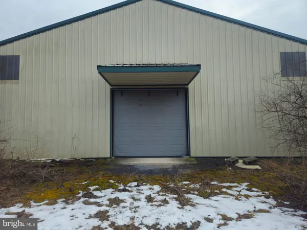 a view of a backyard of a house