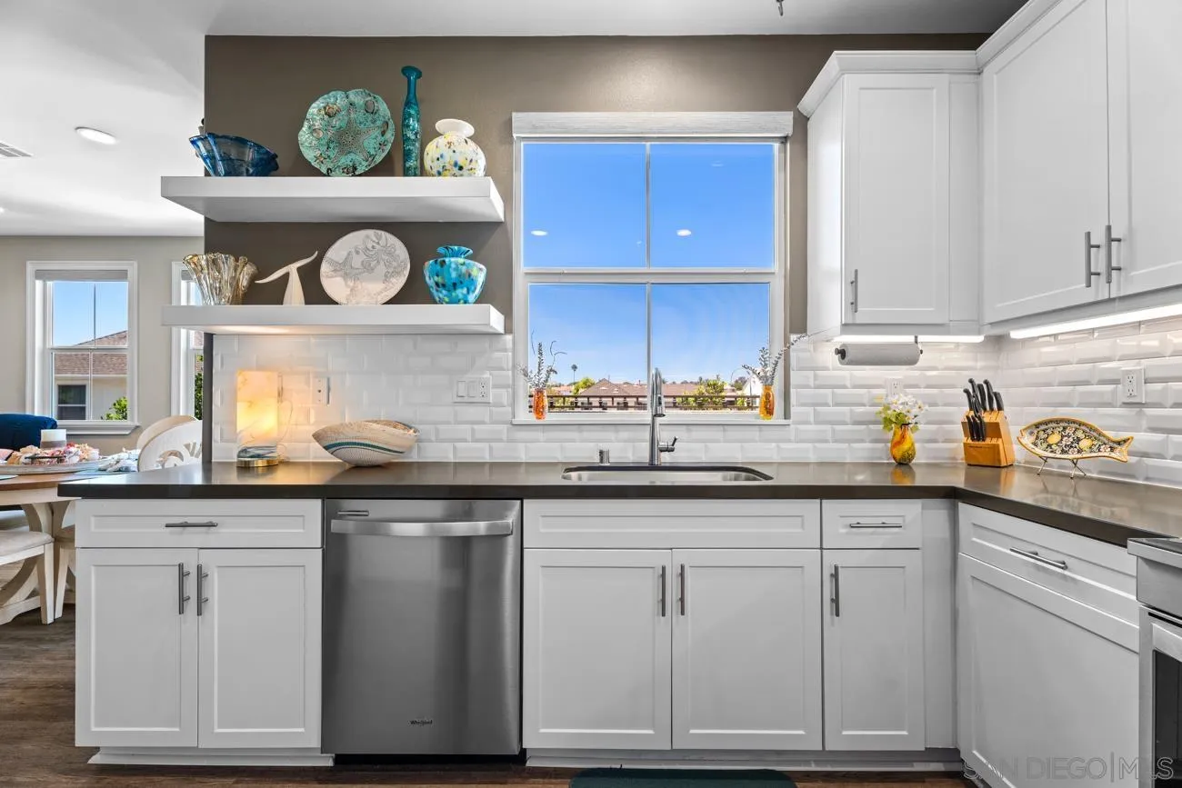 4326 Star Path Way, Unit 1 Oceanside, CA 92056 - Photo 19 of 46 a kitchen with white cabinets and sink