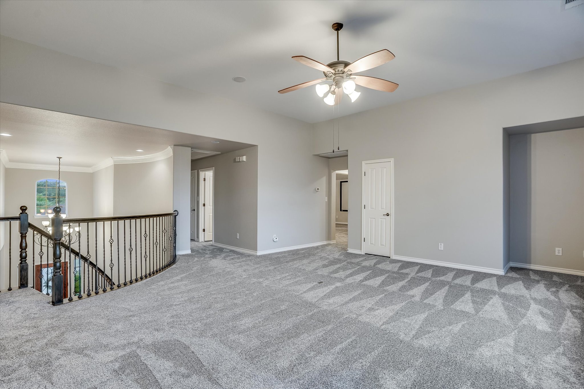 1400 Tom Sawyer Road Austin, TX 78737 - Photo 21 of 40 Large upstairs game room offering additional living and recreation space.