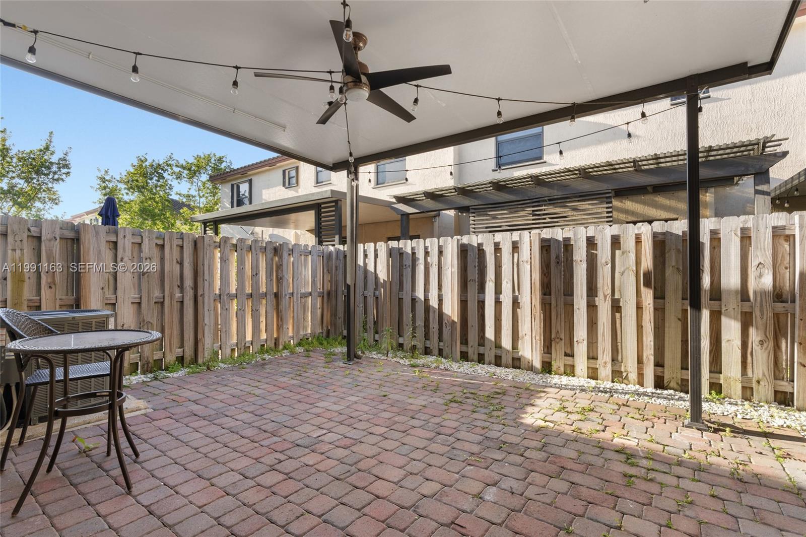 11429 Southwest 253rd Street Homestead, FL 33032 - Photo 24 of 30 a outdoor space with lots of wooden furniture