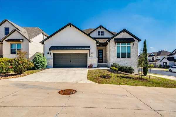 a view of outdoor space yard and front view of a house