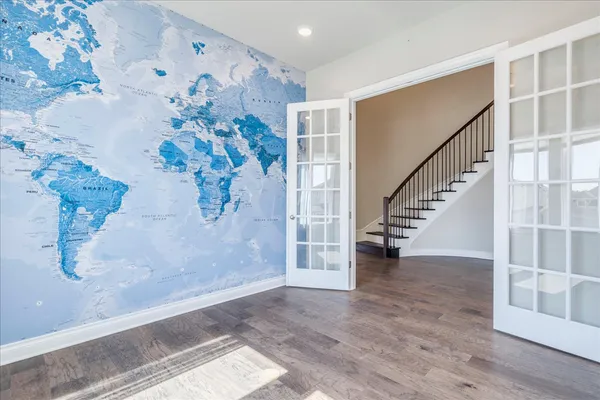 a view of entryway with wooden floor