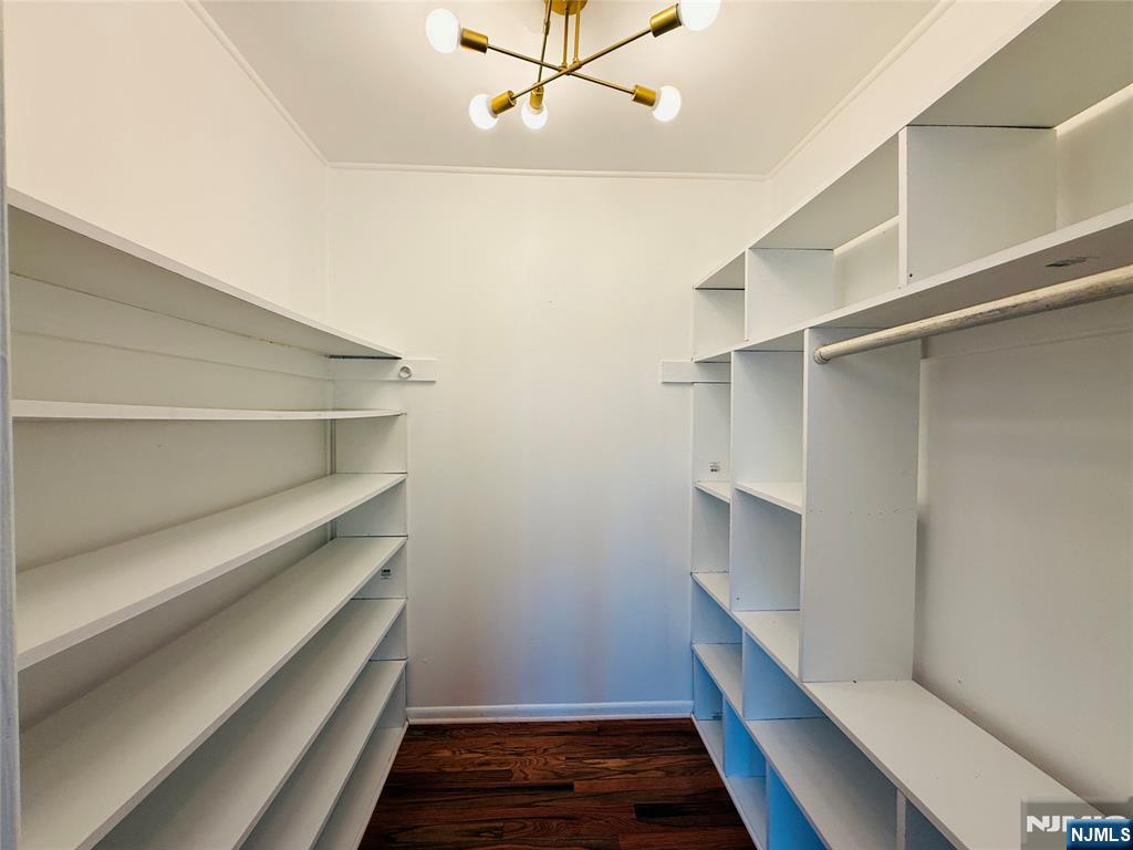 86 West Main Street, Unit FIRST Bergenfield, NJ 07621 - Photo 8 of 23 a storage room with stairs