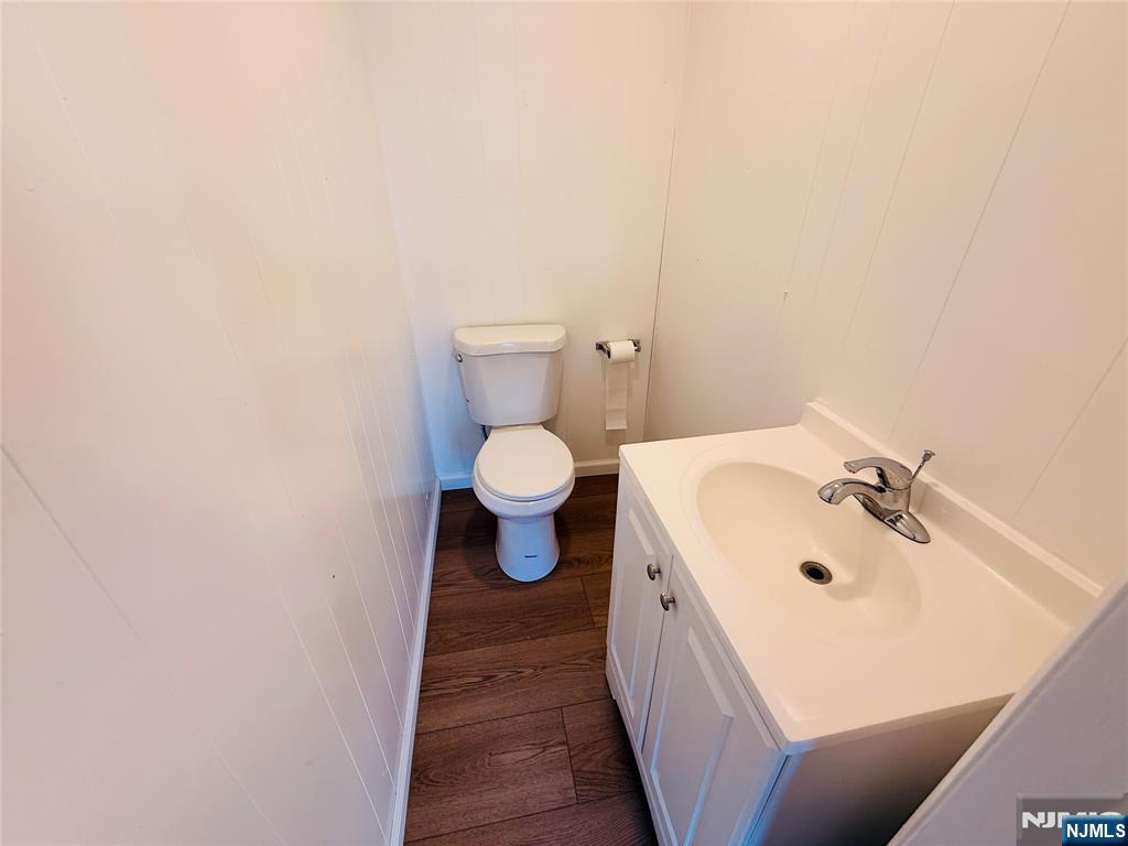 86 West Main Street, Unit FIRST Bergenfield, NJ 07621 - Photo 10 of 23 a bathroom with a sink and a toilet