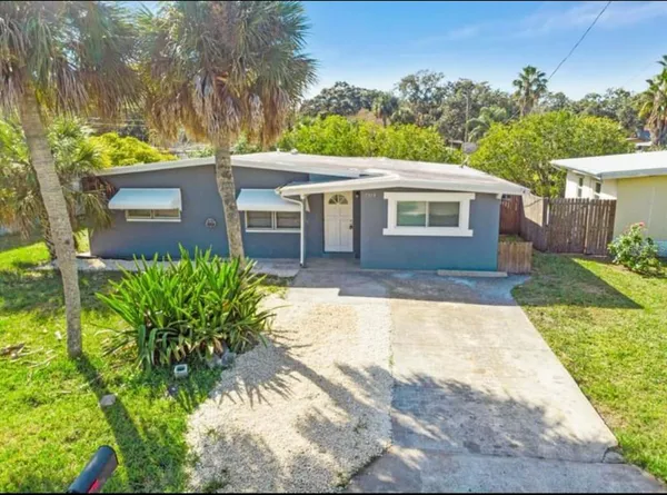front view of a house with a yard