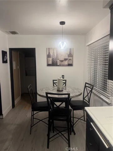 a view of a dining room with furniture