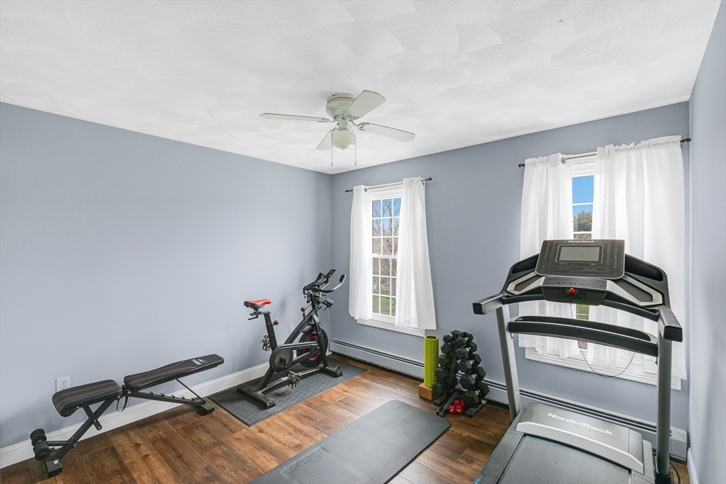 54 Old Merrill Street Amesbury, MA 01913 - Photo 26 of 34 a view of a room with gym equipment