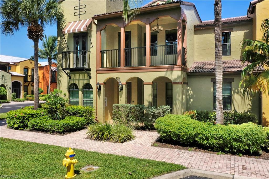 9063 Capistrano Street North, Unit 4405 Naples, FL 34113 - Photo 2 of 40 front view of a house