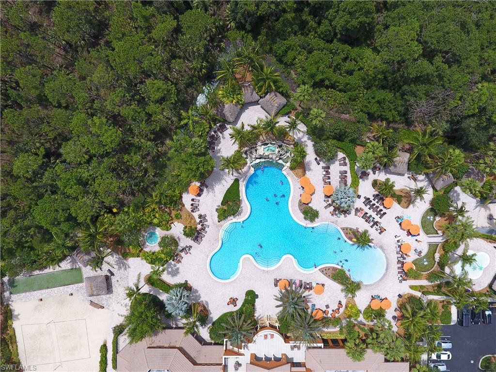 9063 Capistrano Street North, Unit 4405 Naples, FL 34113 - Photo 30 of 40 an aerial view of residential house with outdoor space and parking