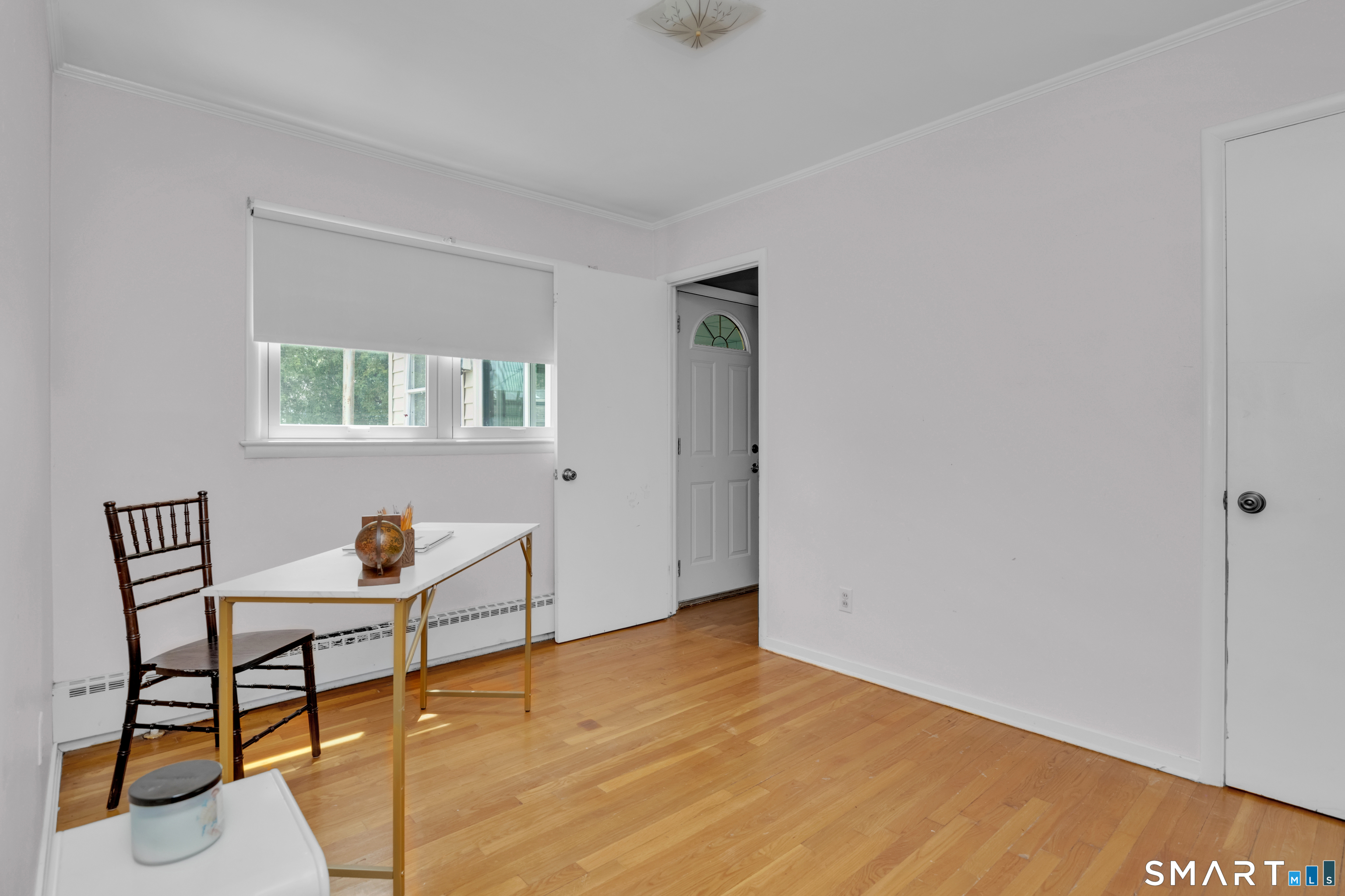81 Crystal Street Wethersfield, CT 06109 - Photo 26 of 40 a workspace room with furniture and wooden floor
