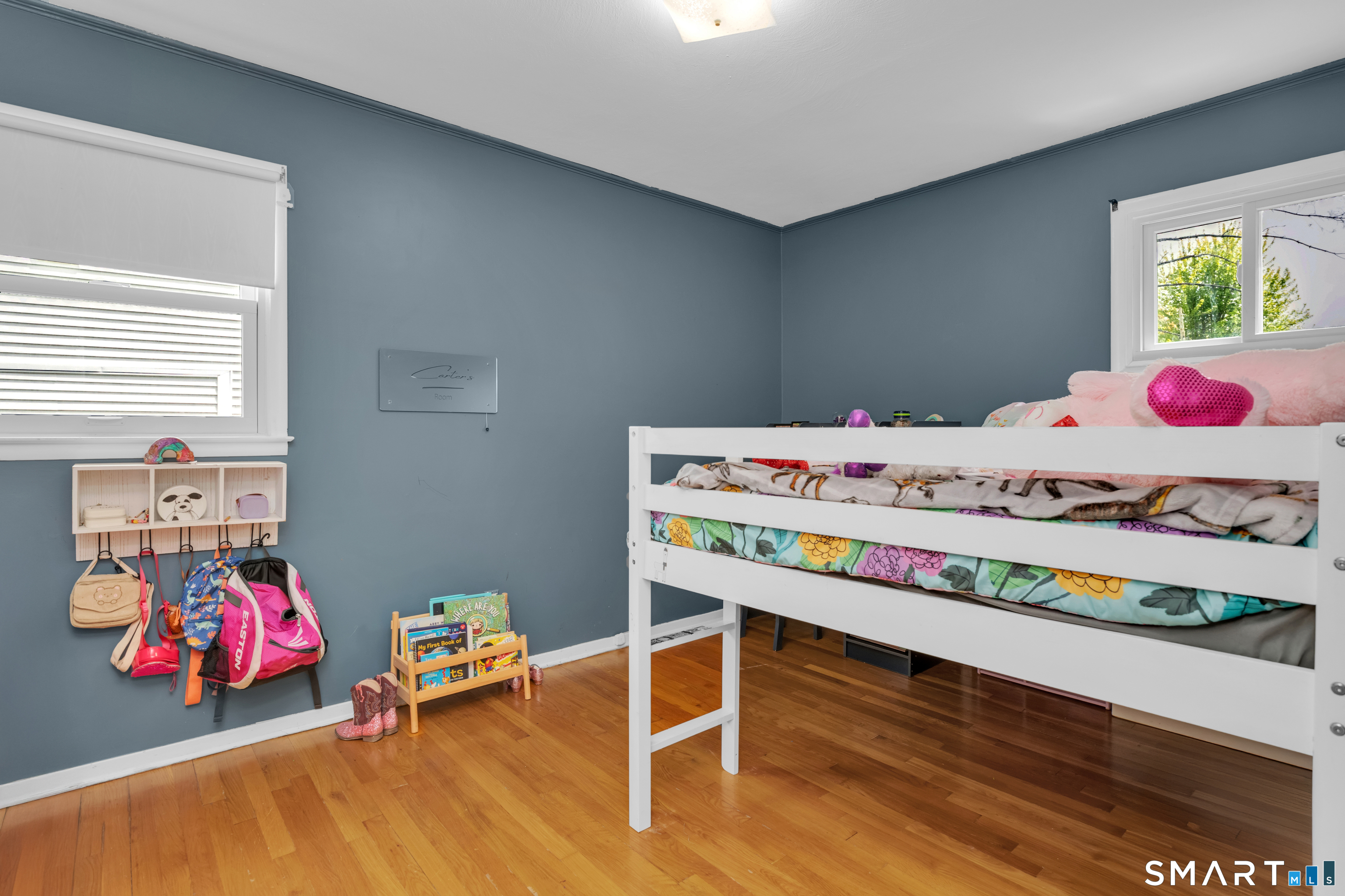 81 Crystal Street Wethersfield, CT 06109 - Photo 29 of 40 a bedroom with a bed and a table