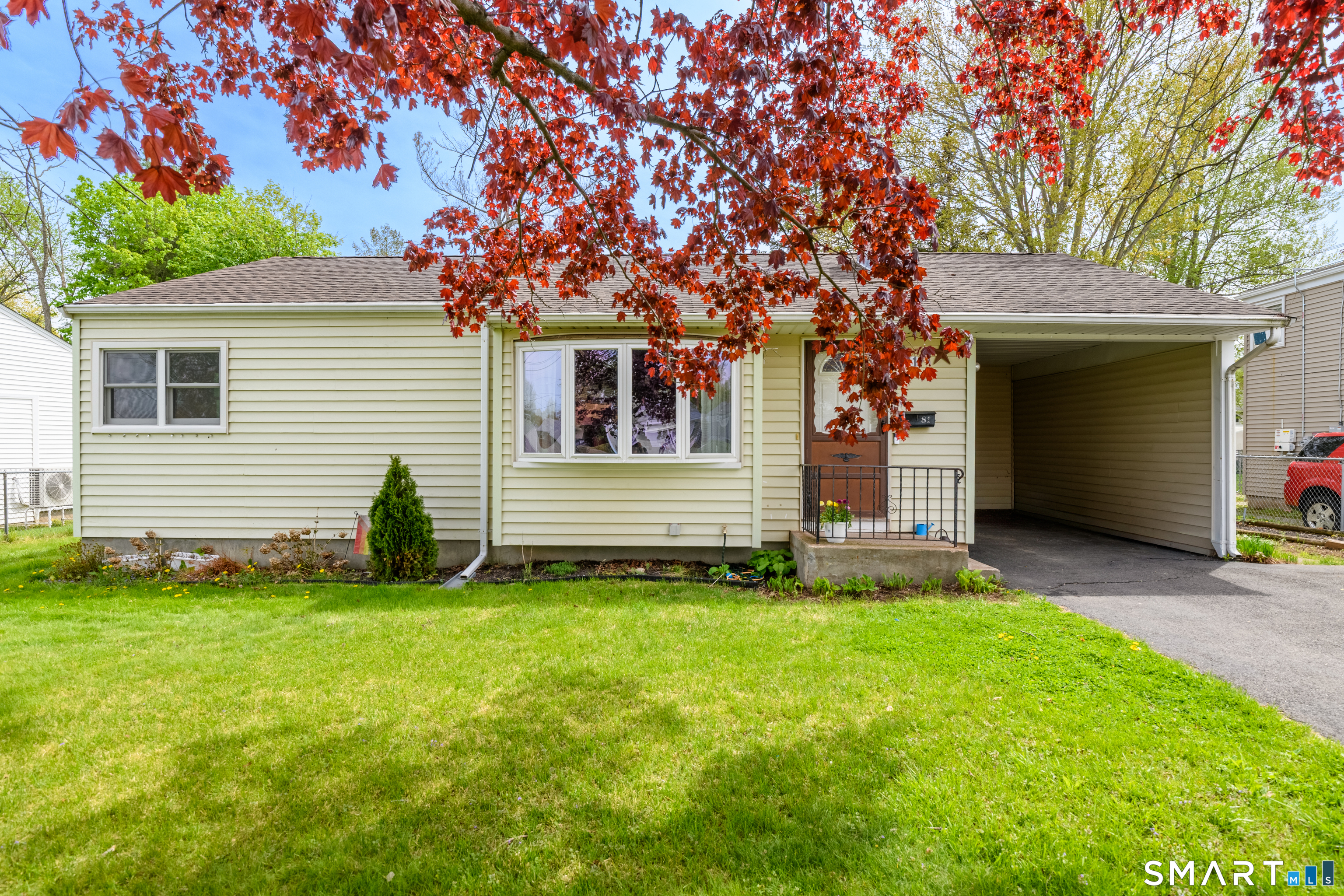 81 Crystal Street Wethersfield, CT 06109 - Photo 4 of 40 a view of a house with a yard