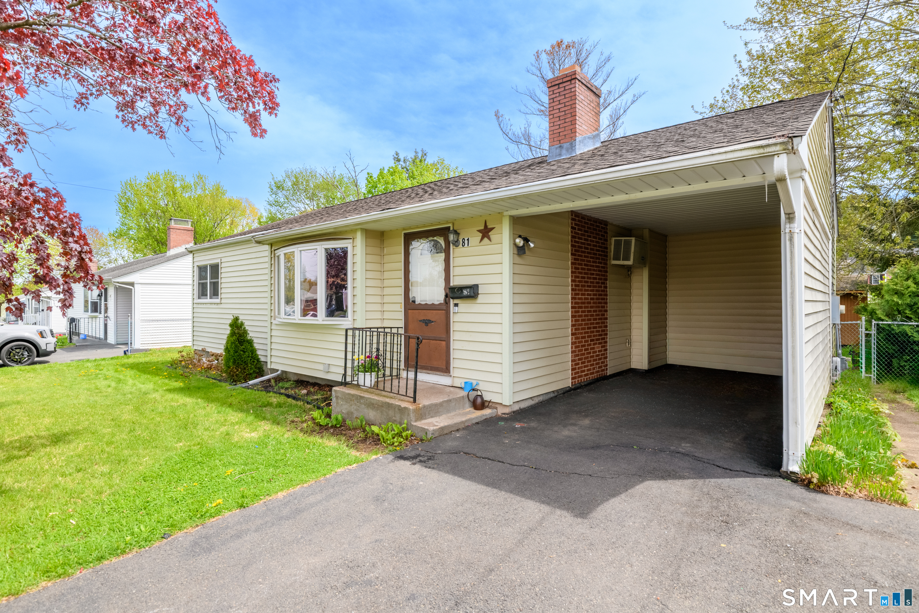 81 Crystal Street Wethersfield, CT 06109 - Photo 5 of 40 a view of a house with a yard