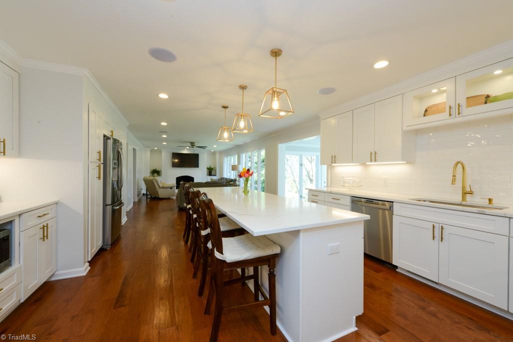 1410 Heathcliff Road High Point, NC 27262 - Photo 18 of 50 View from the kitchen into the great room