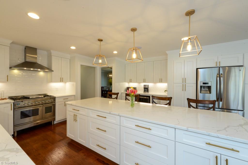 1410 Heathcliff Road High Point, NC 27262 - Photo 20 of 50 This is the most beautiful kitchen I have ever seen! Huge Island and 6 burner range