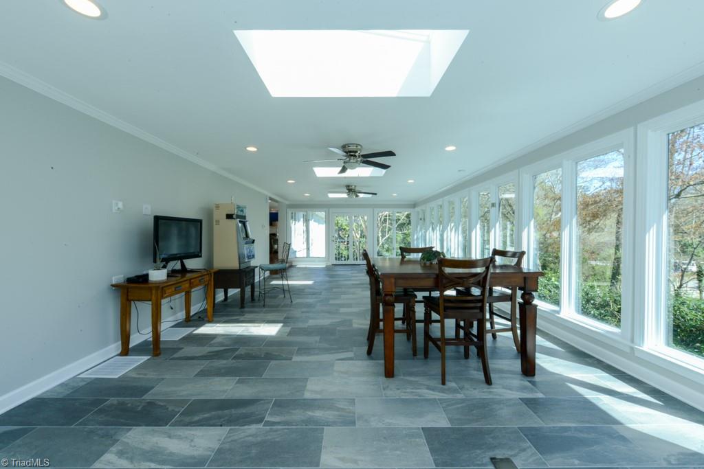 1410 Heathcliff Road High Point, NC 27262 - Photo 28 of 50 This sunroom is HUGE!