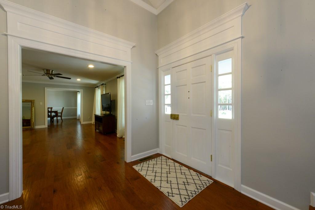 Gracious foyer with 5" hand scraped hardwood floors