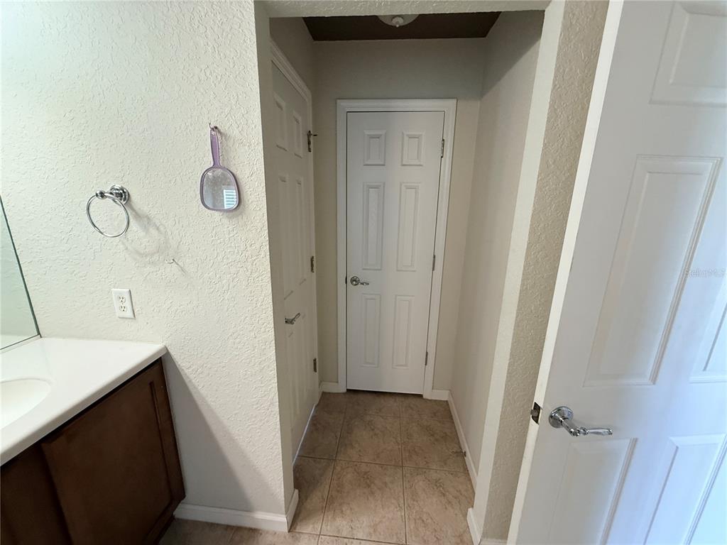 4199 Southwest 46th Court Ocala, FL 34474 - Photo 37 of 50 a bathroom with a sink and a mirror
