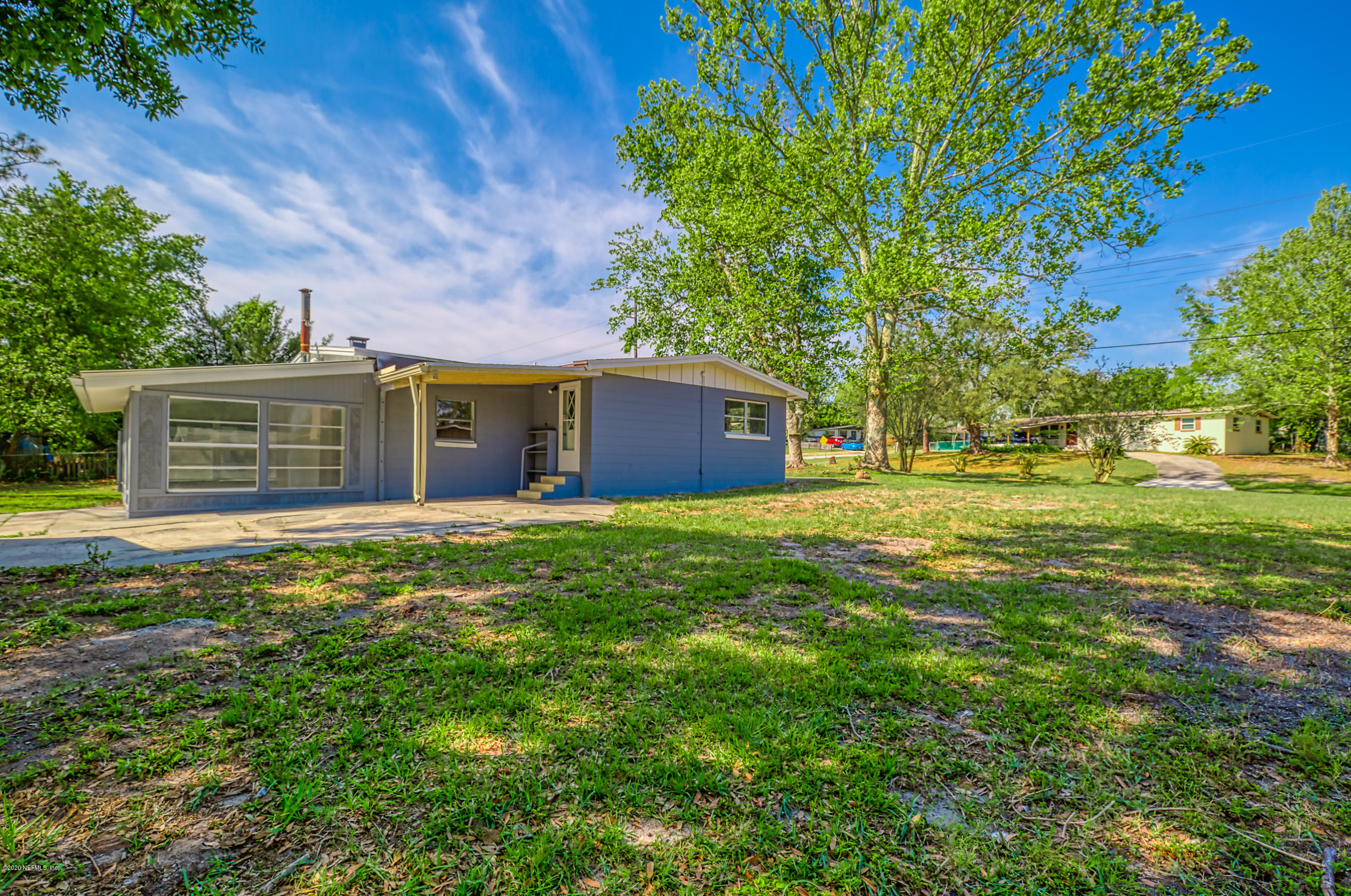 471 Sigsbee Road Orange Park, FL 32073 - Photo 15 of 17 a view of a house with a backyard