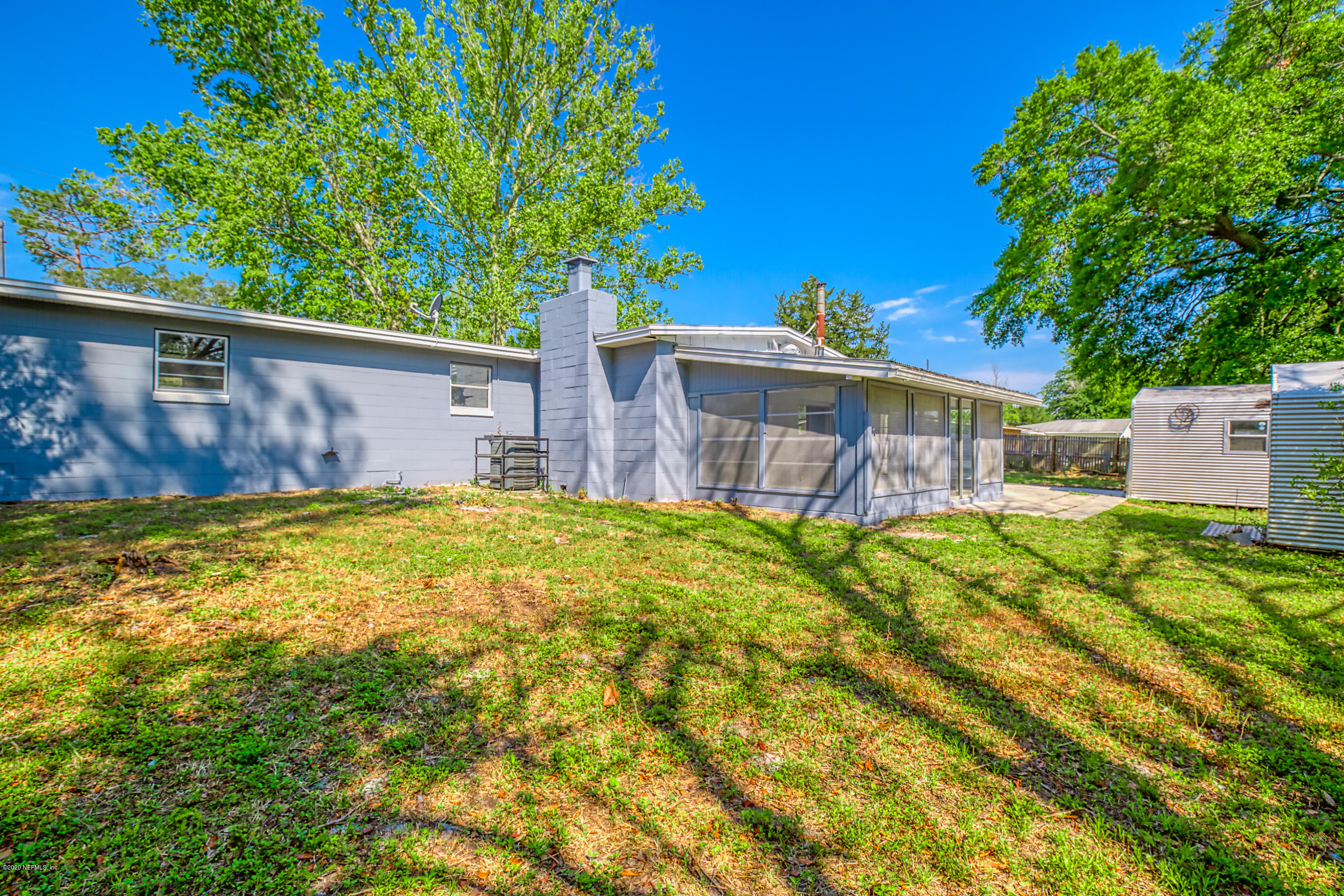 471 Sigsbee Road Orange Park, FL 32073 - Photo 16 of 17 a view of a house with a yard
