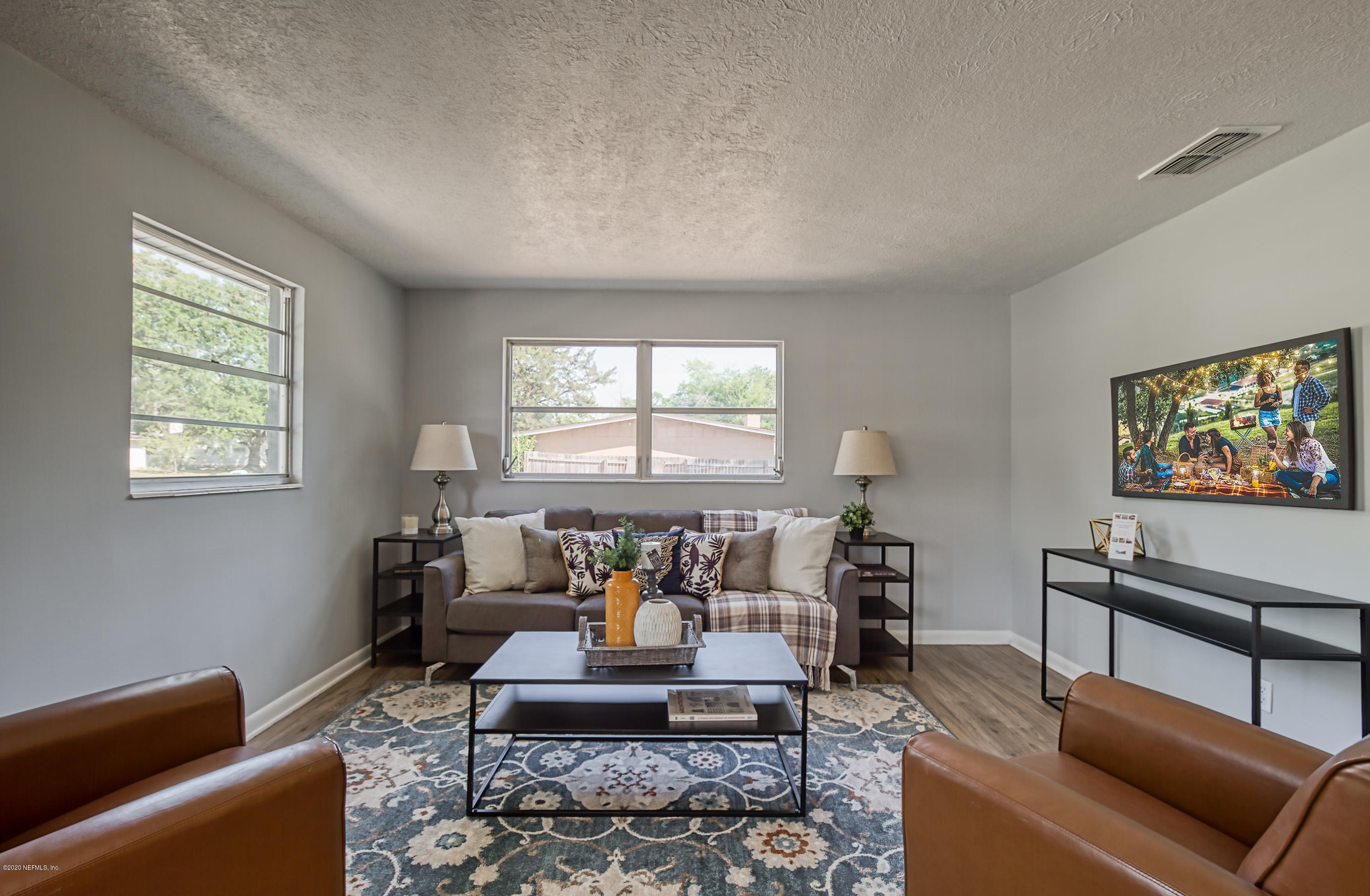 471 Sigsbee Road Orange Park, FL 32073 - Photo 8 of 17 a living room with furniture and a window