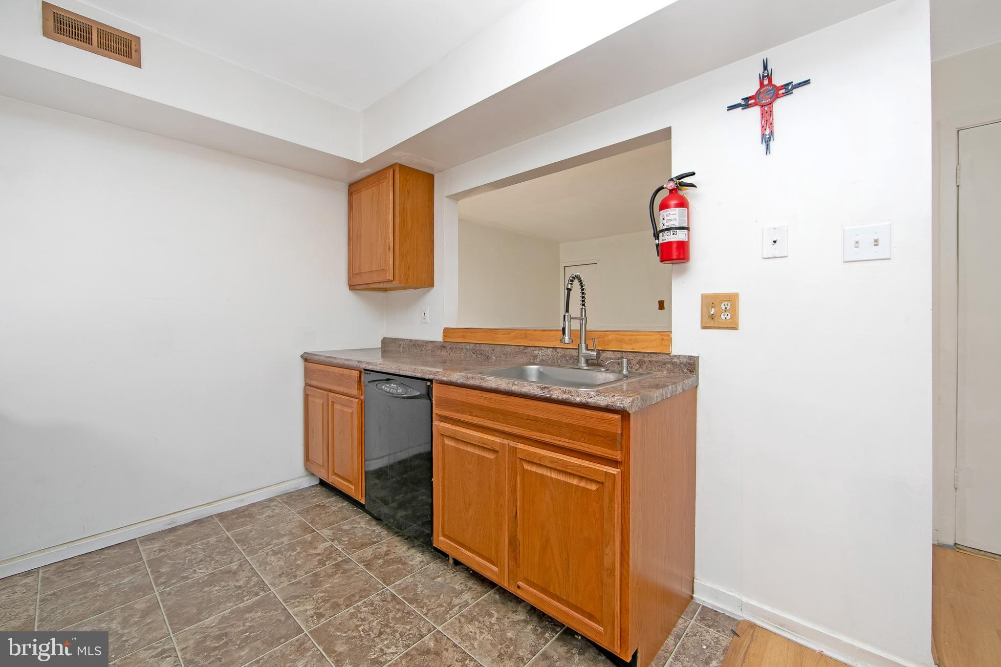 2207 Sandra Road Voorhees, NJ 08043 - Photo 9 of 24 a bathroom with a sink and a mirror