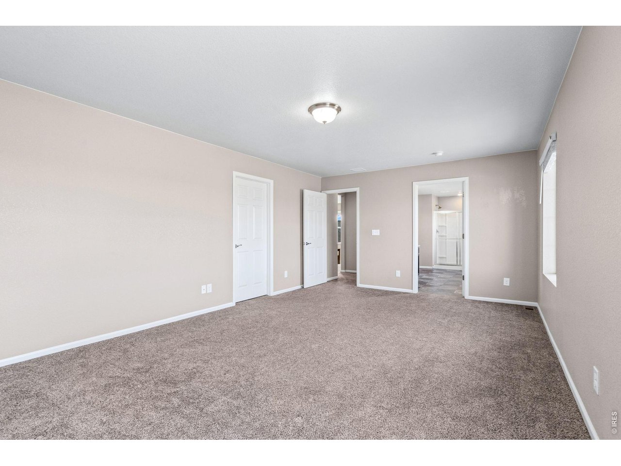 415 3rd Street Severance, CO 80550 - Photo 16 of 21 a view of an empty room and closet area