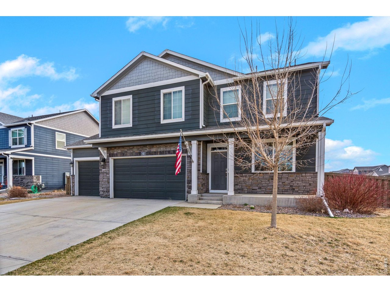 415 3rd Street Severance, CO 80550 - Photo 2 of 21 a house view with a outdoor space